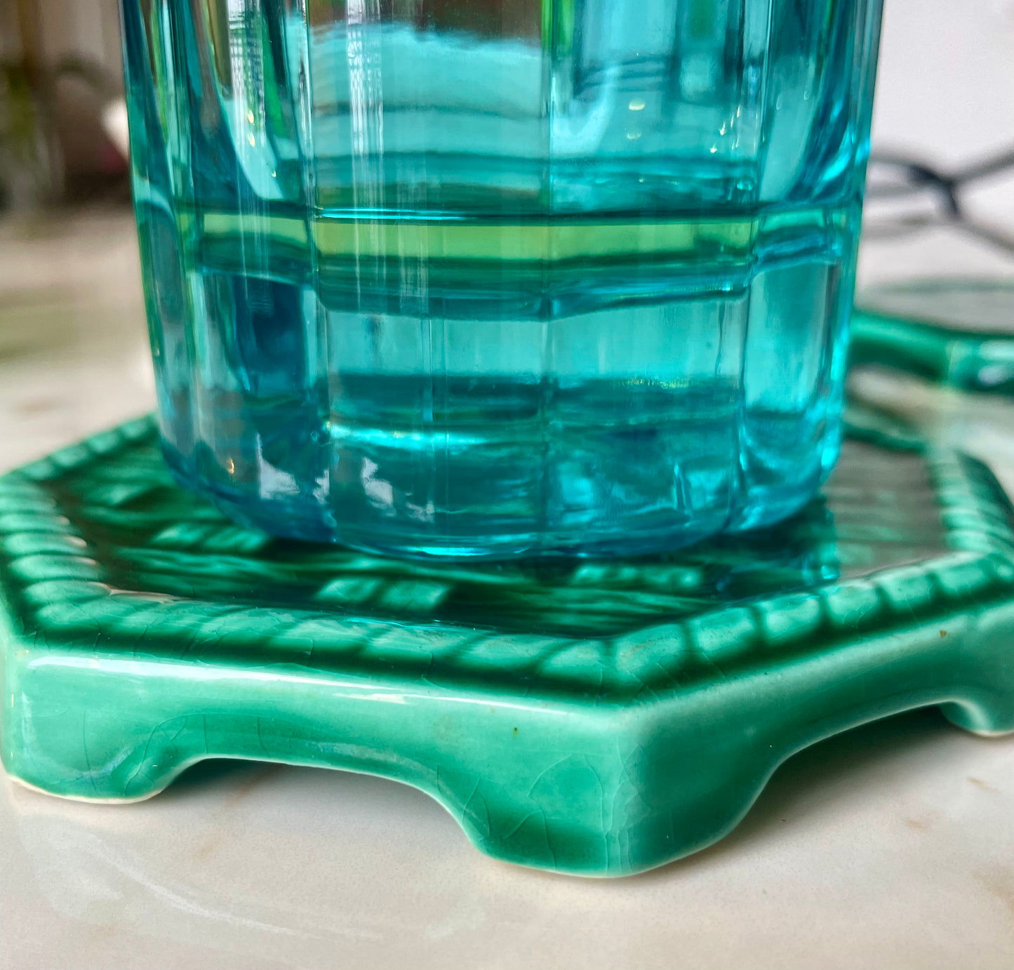 Pair of ceramic bottle coasters