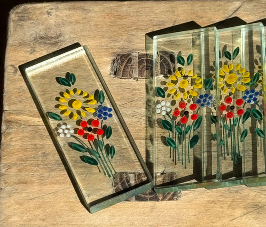 8 porte-couteaux motif fleuri