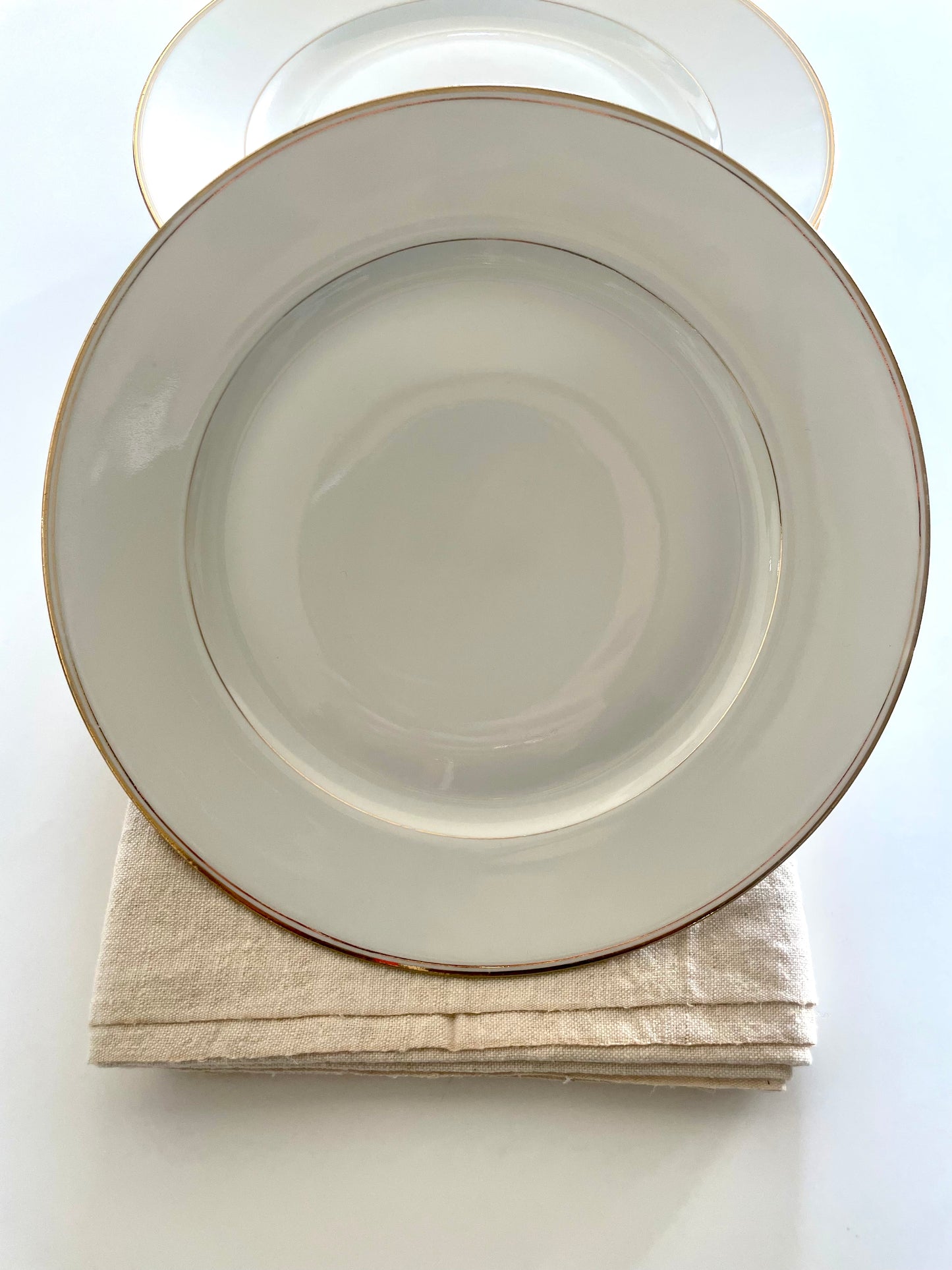 Georges Boyer white Limoges porcelain dinner service with gold edging