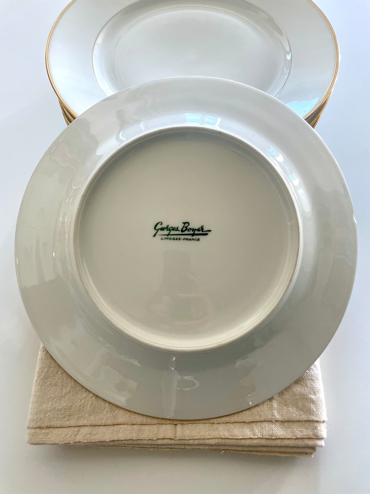 Georges Boyer white Limoges porcelain dinner service with gold edging