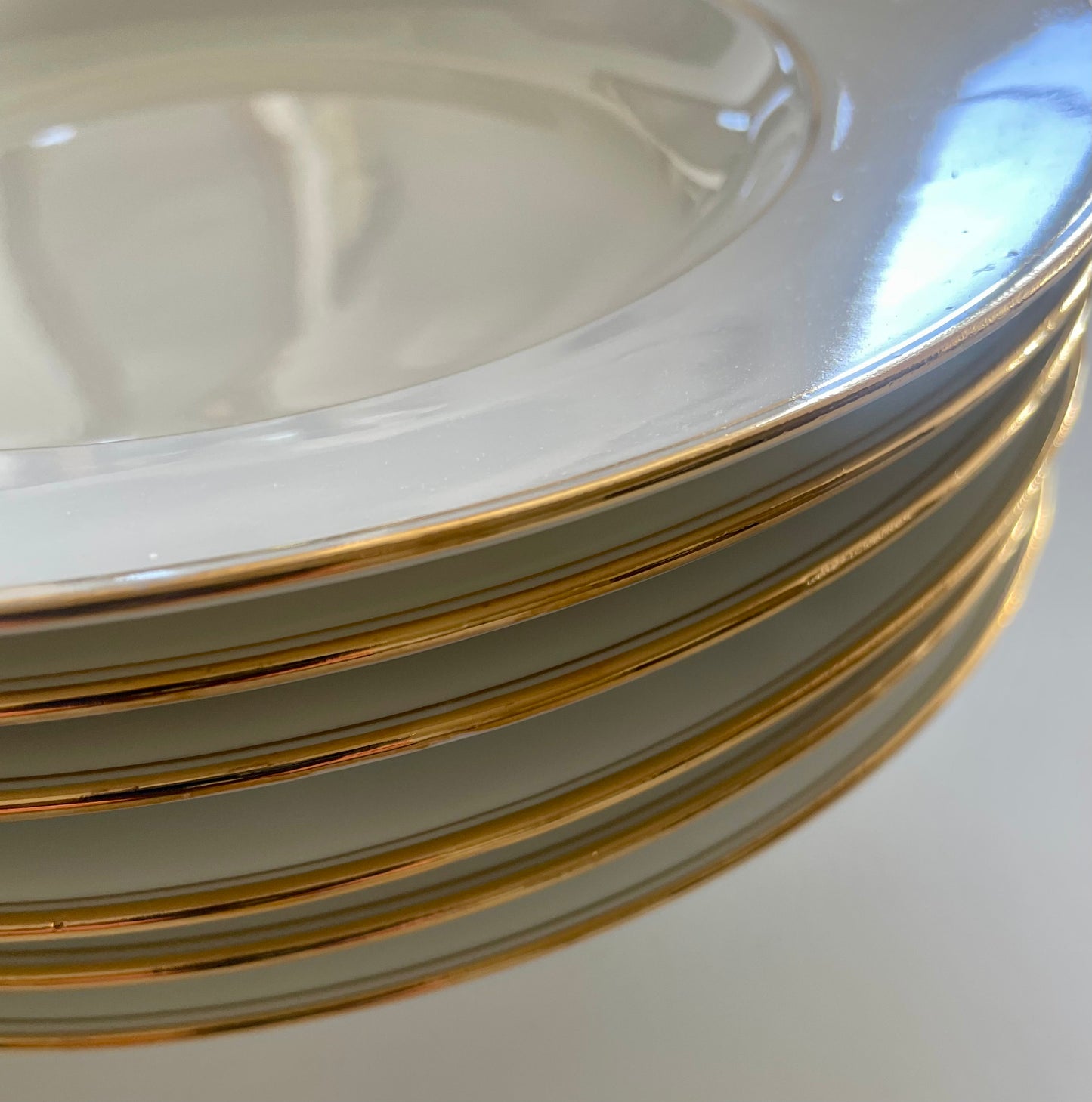 Georges Boyer white Limoges porcelain dinner service with gold edging