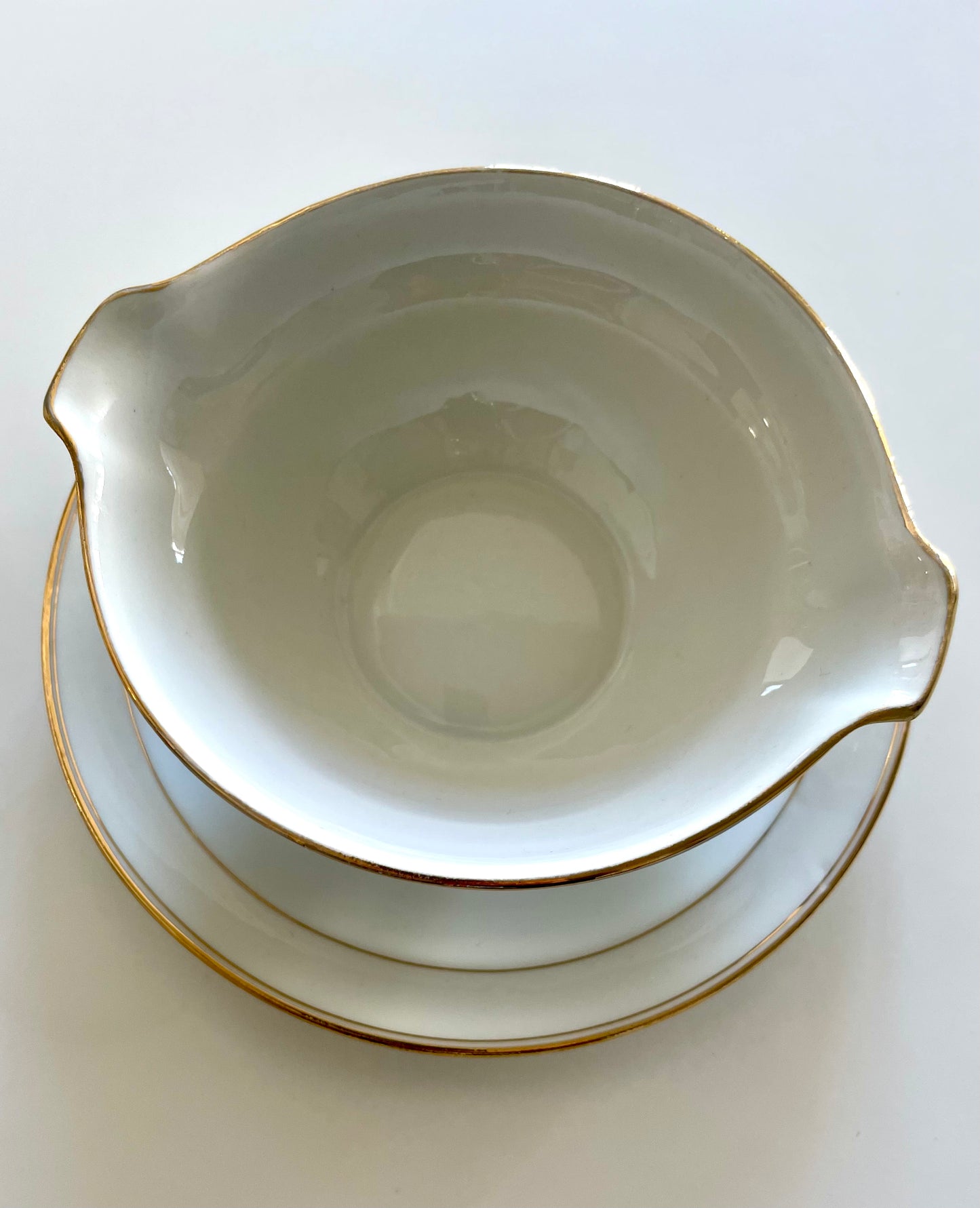 Georges Boyer white Limoges porcelain dinner service with gold edging