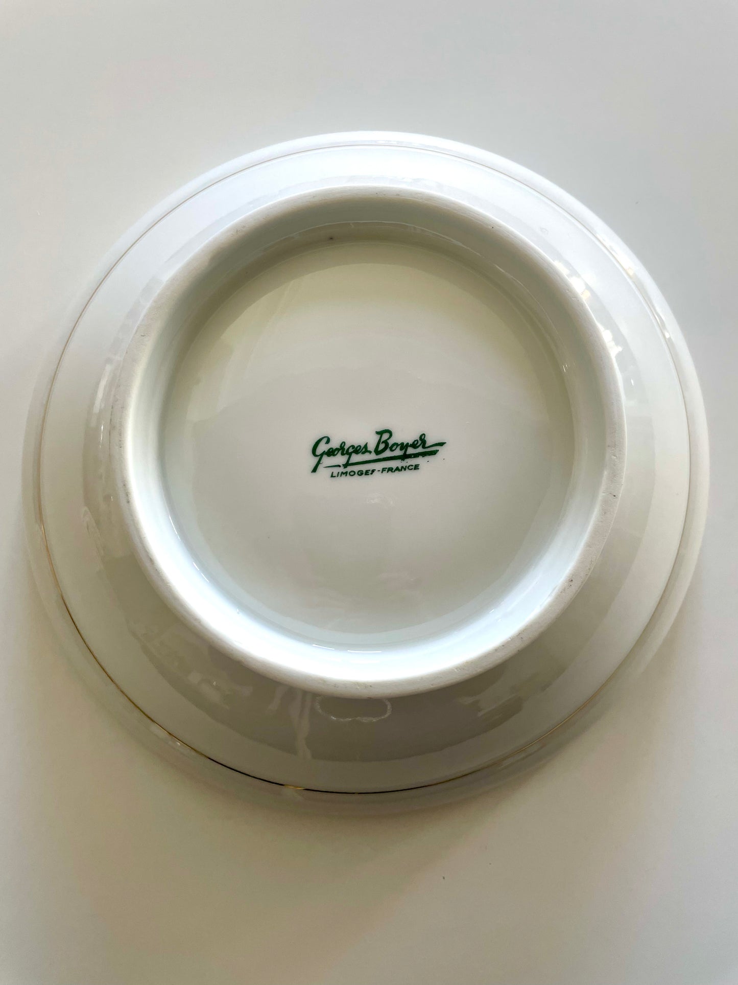 Georges Boyer white Limoges porcelain dinner service with gold edging