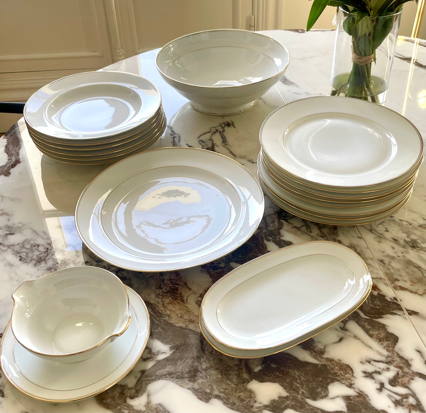 Georges Boyer white Limoges porcelain dinner service with gold edging