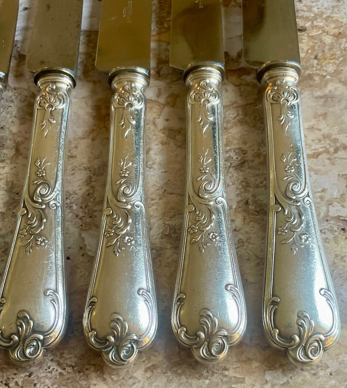10 silver metal knives