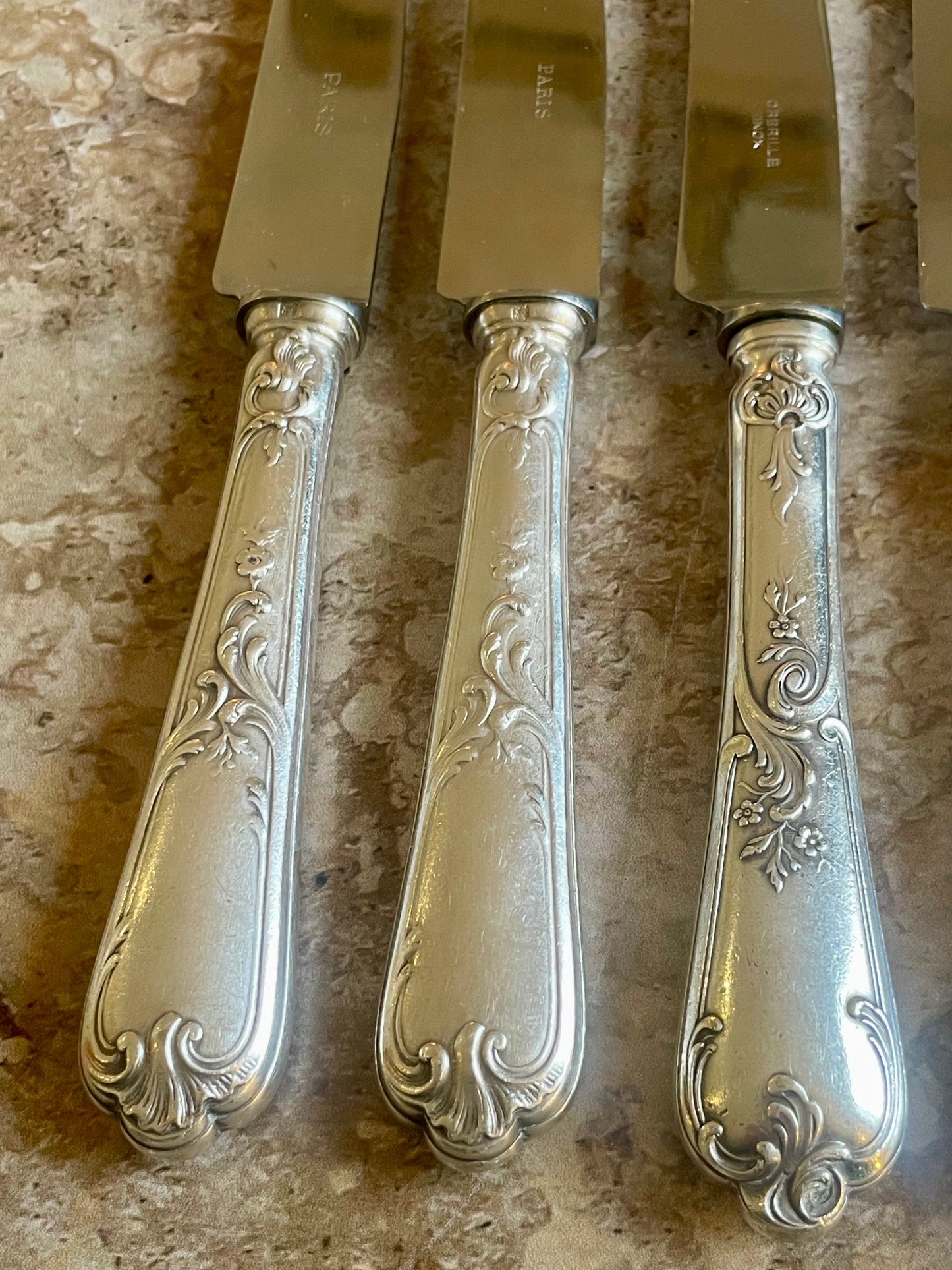 10 silver metal knives