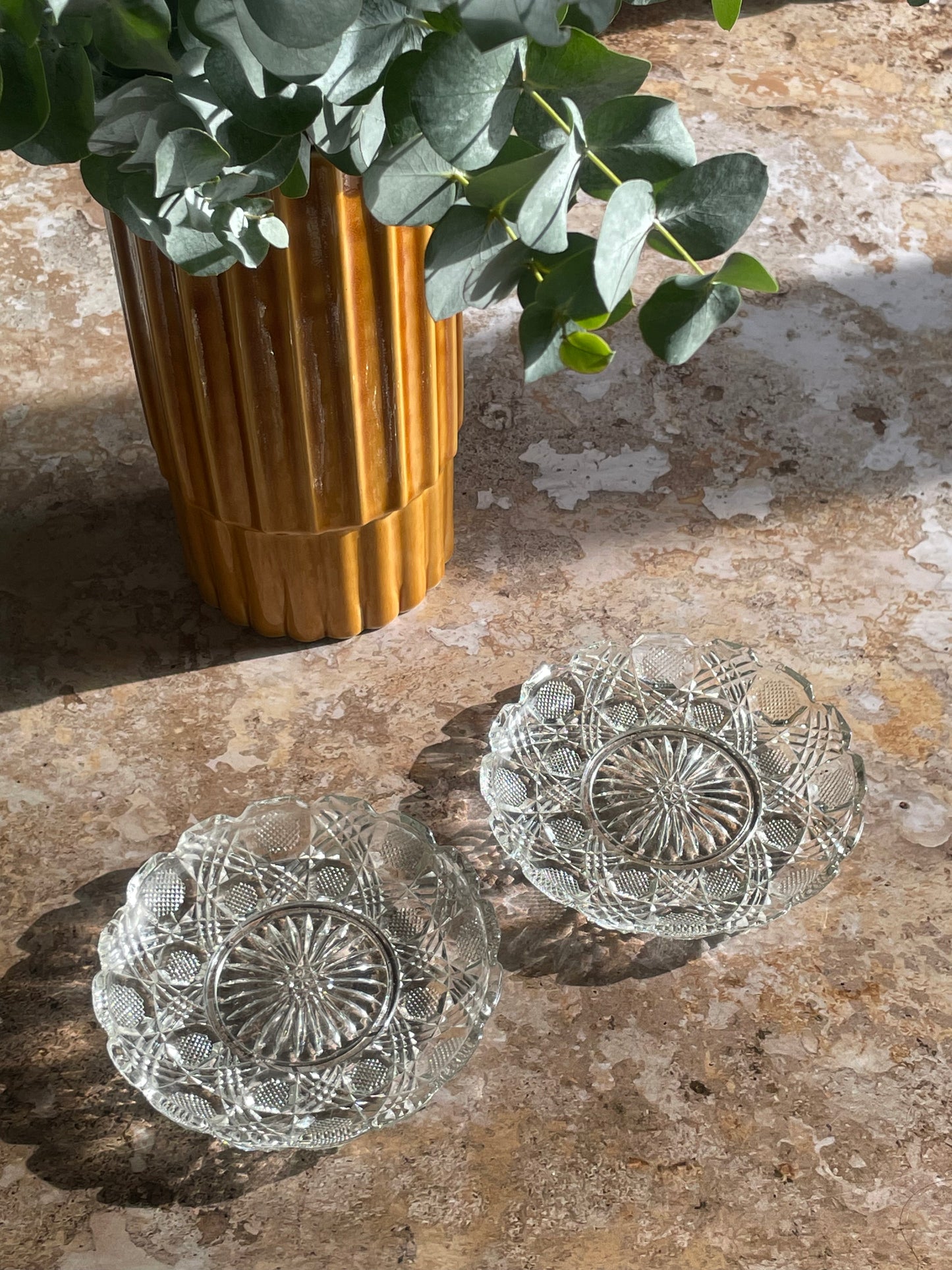 Pair of bottle coasters.