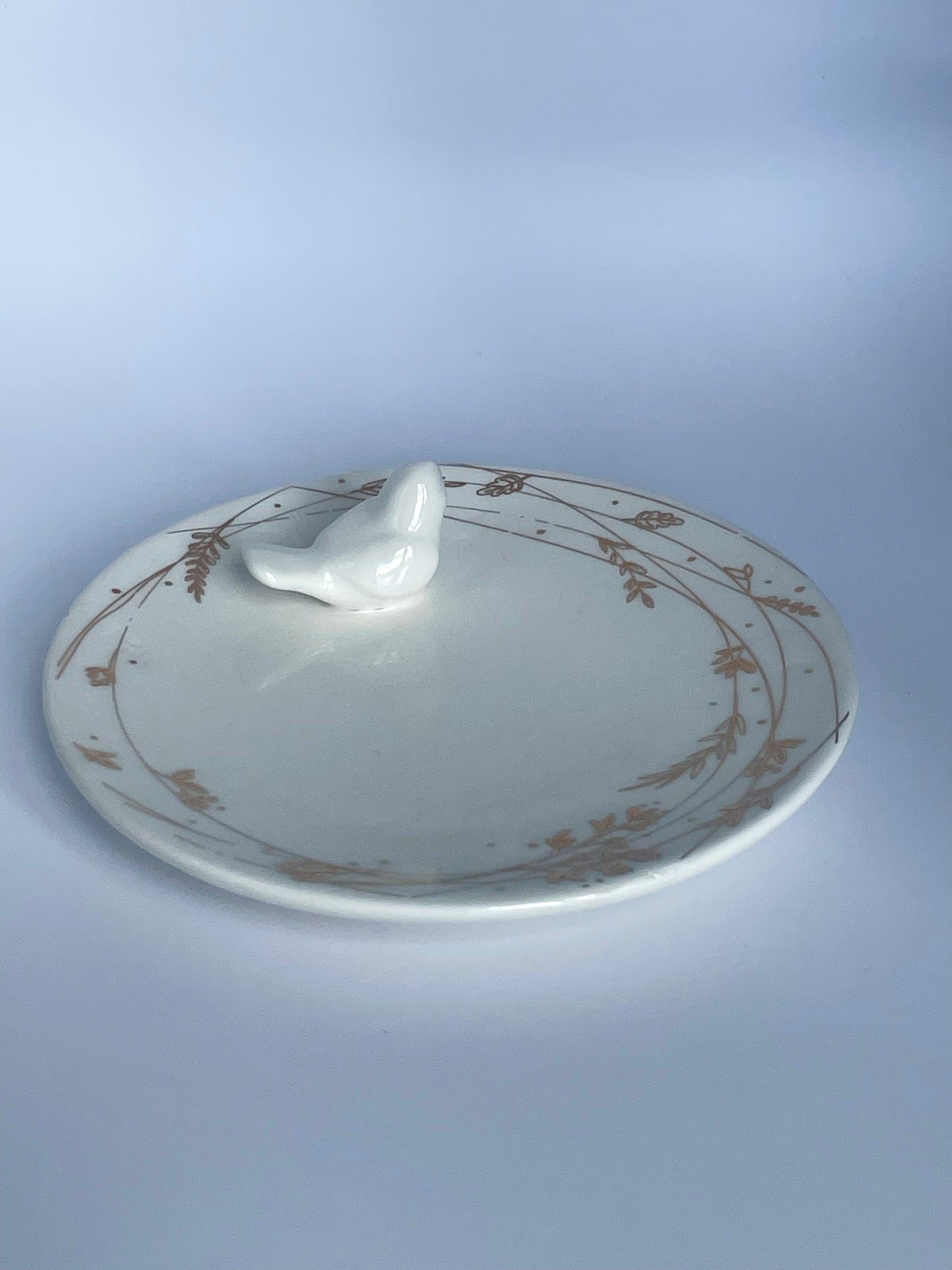 Ceramic bowl with a little bird