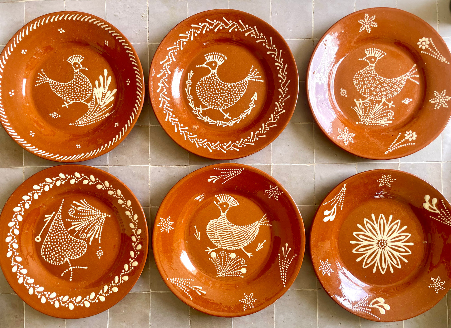 6 hand decorated Portuguese clay plates